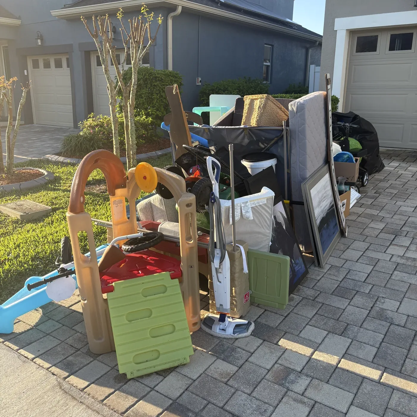 Junk removal items staged neatly near a front door