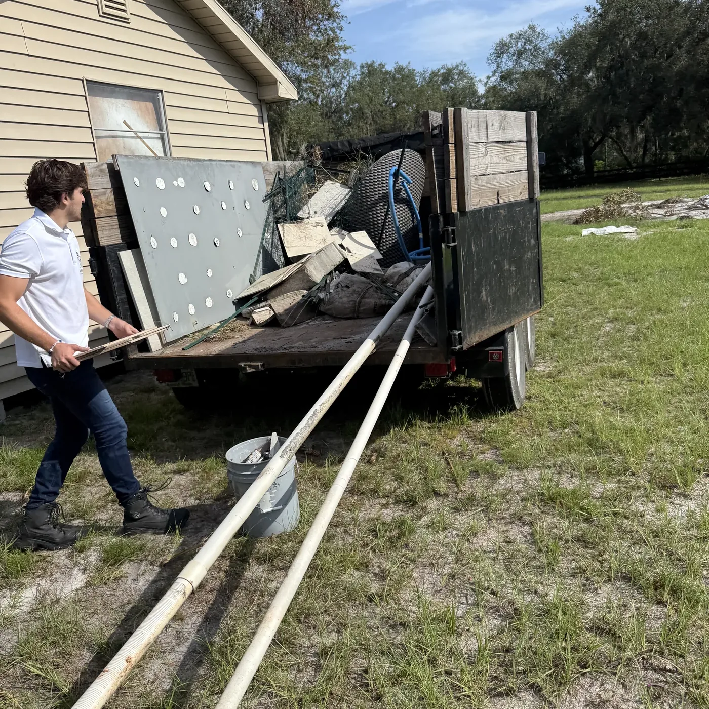 Two brothers loading a sofa into a truck in an Orlando neighborhood in the early days